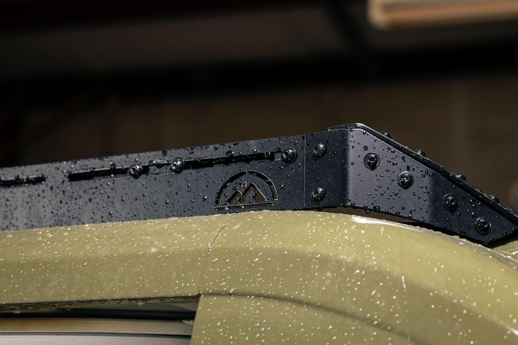 Close view of the locally made Unaka roof rack installed on the van