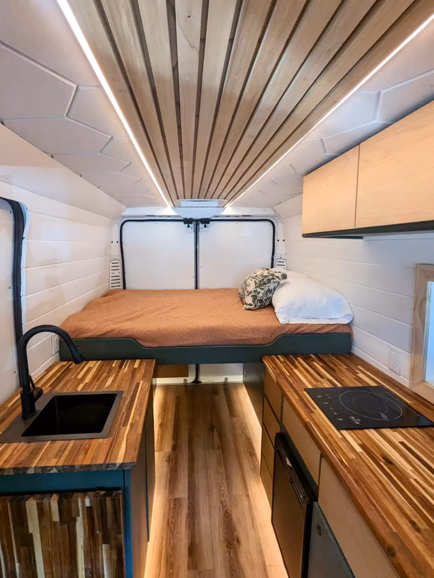 Finished van interior showing real wood construction